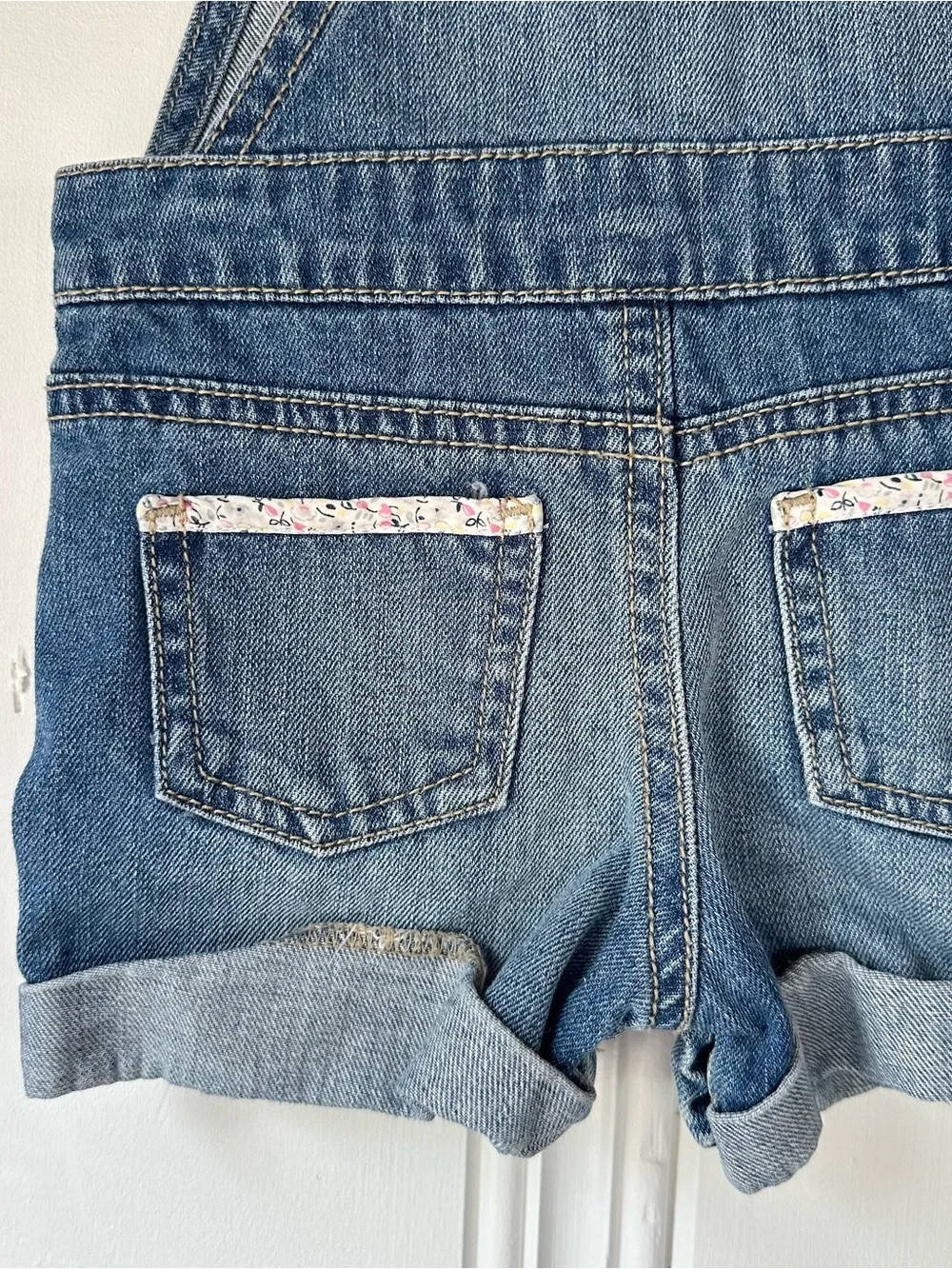 OshKosh B'gosh 12M Blue Denim Short Overalls with Floral Trim